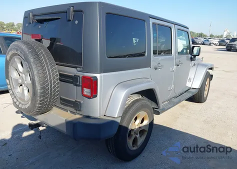 2015 Jeep Wrangler Unlimited Sahara z USA, uszkodzony, nr VIN 1C4BJWEGXFL603690